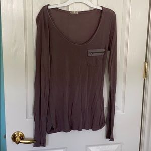 Purple long sleeve with zipper pocket front